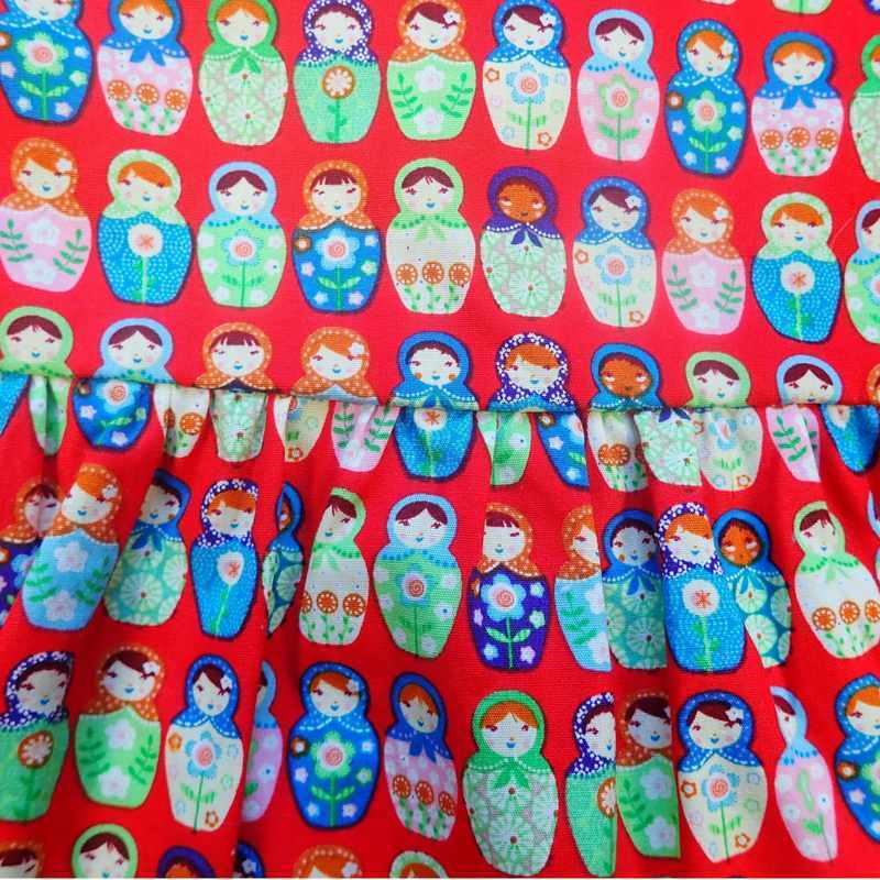 Robe bébé rouge motif poupées russes made in France