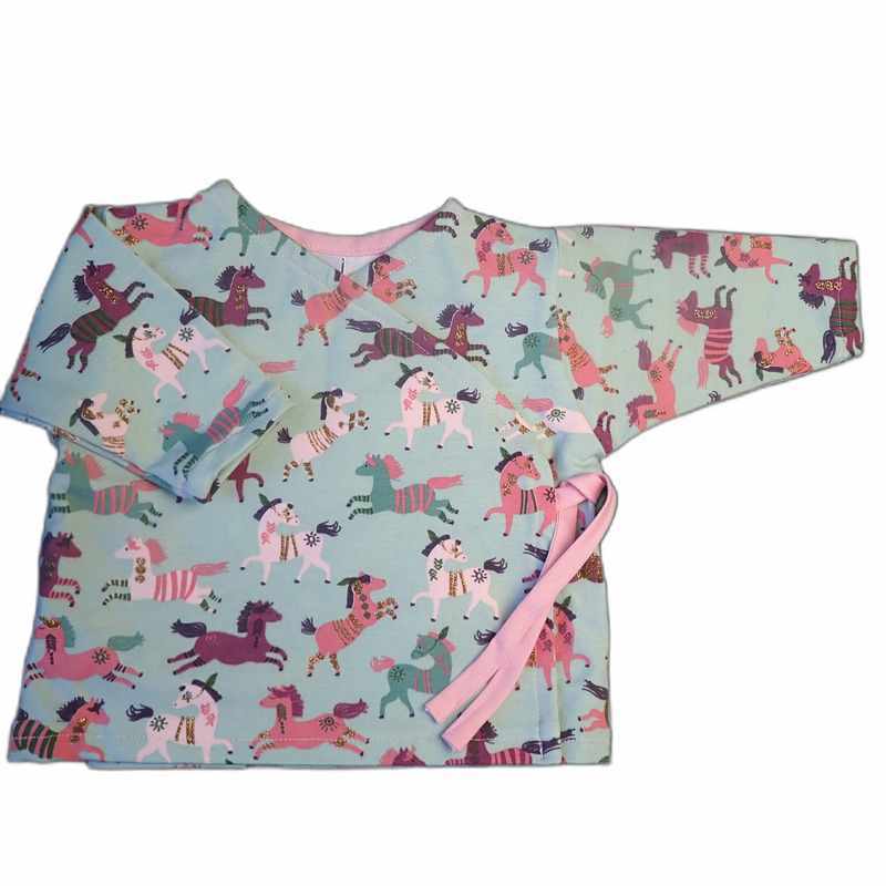 Brassière verte bébé motif chevaux dorés